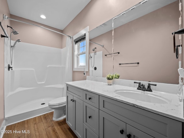 500 Perth Ct, Hubert, NC 28539 - full bath featuring vanity, wood finished floors, a shower with shower curtain, and recessed lighting