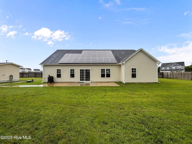 500 Perth Ct, Hubert, NC 28539 - back of house featuring a patio area and roof mounted solar panels