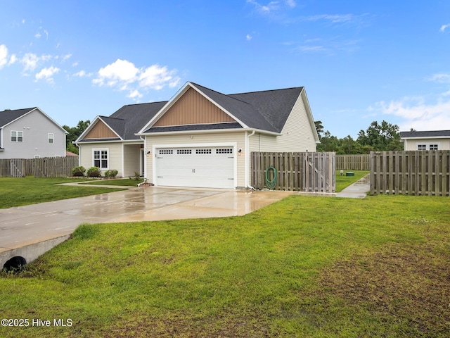 500 Perth Ct, Hubert, NC 28539 - view of front of home with driveway, board and batten siding, and a garage