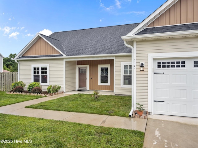 500 Perth Ct, Hubert, NC 28539 - ranch-style house featuring board and batten siding, a shingled roof, and an attached garage