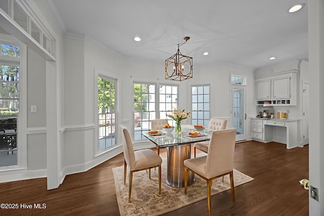 3902 Kipling Ct, Greenville, NC 27834 - dining space featuring healthy amount of natural light, a chandelier, recessed lighting, ornamental molding, and dark wood-style floors