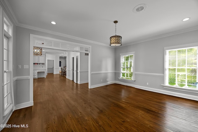 3902 Kipling Ct, Greenville, NC 27834 - spare room featuring dark wood-style flooring, ornamental molding, a chandelier, and recessed lighting