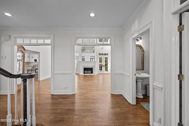 3902 Kipling Ct, Greenville, NC 27834 - corridor featuring crown molding, dark wood-style flooring, recessed lighting, and stairs