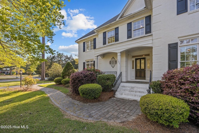 3902 Kipling Ct, Greenville, NC 27834 - view of front of home with a front yard and brick siding
