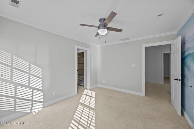 3902 Kipling Ct, Greenville, NC 27834 - unfurnished room featuring light carpet, a ceiling fan, and ornamental molding