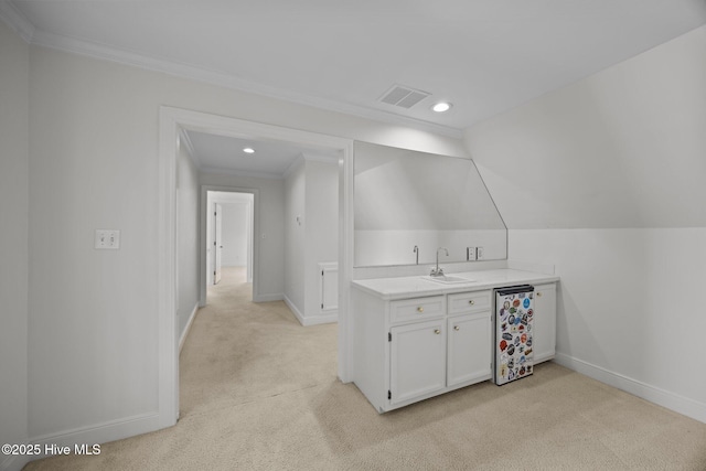 3902 Kipling Ct, Greenville, NC 27834 - indoor wet bar with light carpet, ornamental molding, and recessed lighting