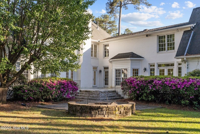 3902 Kipling Ct, Greenville, NC 27834 - rear view of property with a lawn and brick siding
