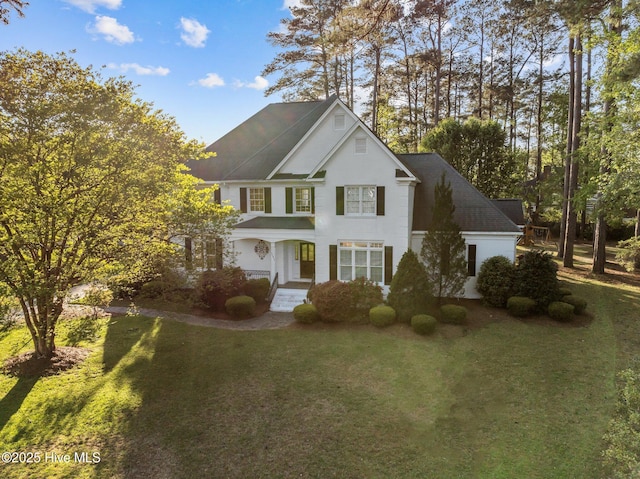 3902 Kipling Ct, Greenville, NC 27834 - view of front of property with a front yard and roof with shingles