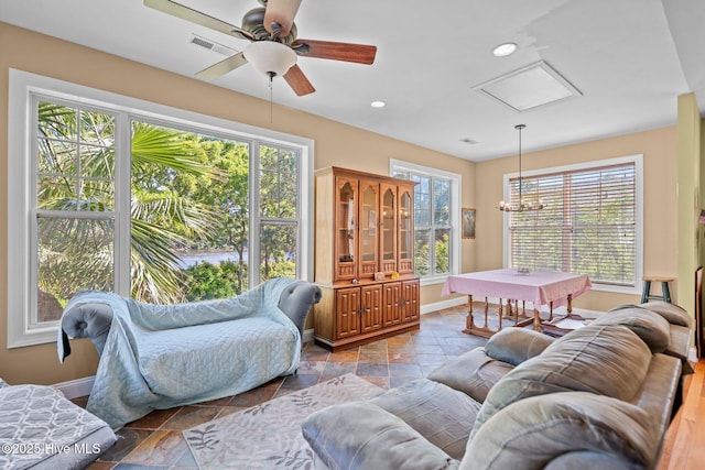 9406 Voyagers Way, Wilmington, NC 28412 - living area with plenty of natural light, a ceiling fan, and recessed lighting