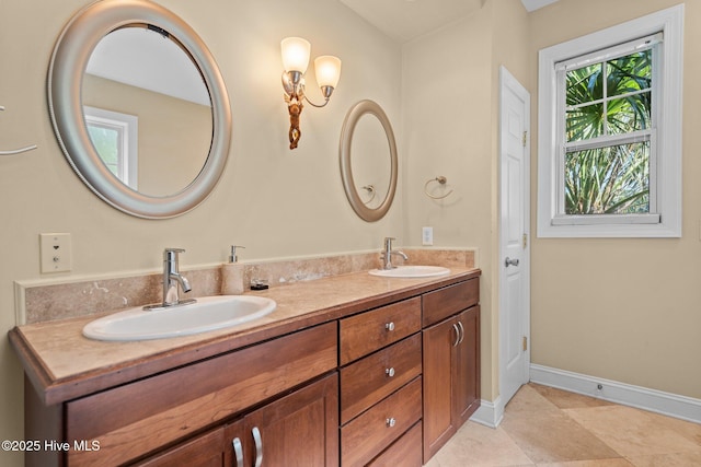 9406 Voyagers Way, Wilmington, NC 28412 - full bathroom with double vanity and baseboards