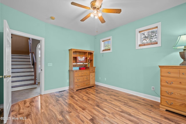 9406 Voyagers Way, Wilmington, NC 28412 - bedroom featuring wood finished floors and ceiling fan