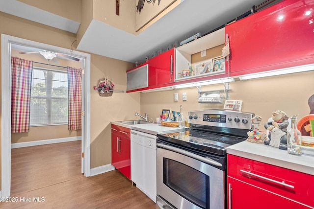 9406 Voyagers Way, Wilmington, NC 28412 - kitchen featuring electric stove, red cabinetry, white dishwasher, wood finished floors, and open shelves