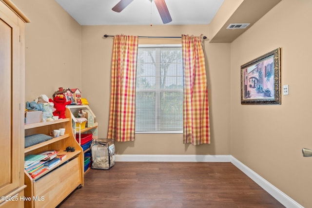 9406 Voyagers Way, Wilmington, NC 28412 - recreation room featuring dark wood-style flooring and a ceiling fan