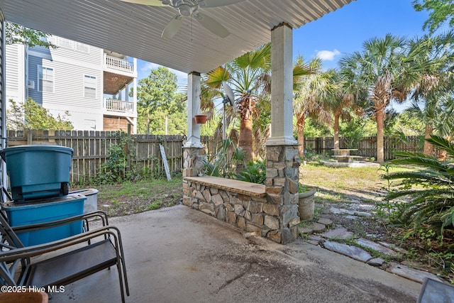 9406 Voyagers Way, Wilmington, NC 28412 - fenced backyard featuring a ceiling fan and a patio