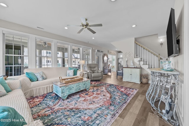 4340 Island Dr, North Topsail Beach, NC 28460 - living room with a ceiling fan, wood finished floors, stairs, and recessed lighting