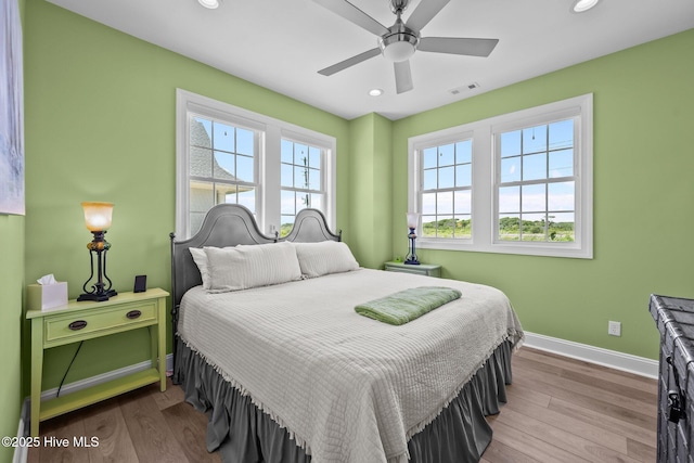 4340 Island Dr, North Topsail Beach, NC 28460 - bedroom featuring recessed lighting, wood finished floors, and ceiling fan