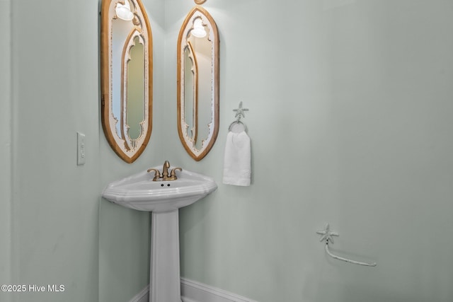 4340 Island Dr, North Topsail Beach, NC 28460 - bathroom featuring a sink