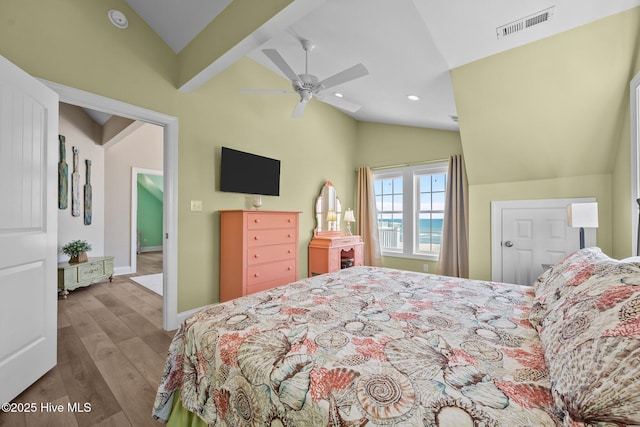 4340 Island Dr, North Topsail Beach, NC 28460 - bedroom featuring lofted ceiling, wood finished floors, recessed lighting, and a ceiling fan