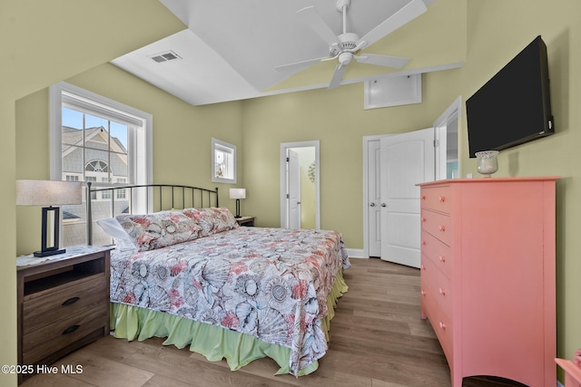 4340 Island Dr, North Topsail Beach, NC 28460 - bedroom featuring wood finished floors and a ceiling fan