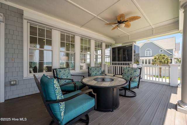 4340 Island Dr, North Topsail Beach, NC 28460 - wooden terrace with a ceiling fan