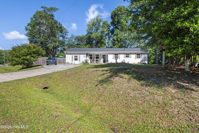 302 Richelieu Rd, Wilmington, NC 28412 - ranch-style house featuring concrete driveway and covered porch