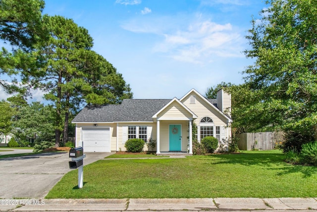 5601 W Chop Way, Wilmington, NC 28412 - view of front of property featuring concrete driveway, a chimney, and an attached garage