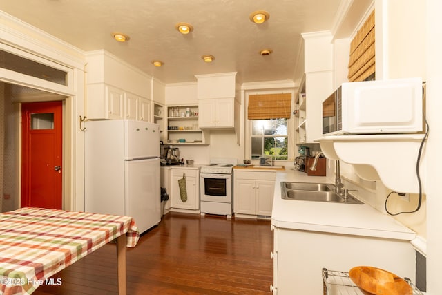 119 S Main St, Colerain, NC 27924 - kitchen featuring white appliances, open shelves, crown molding, light countertops, and white cabinetry
