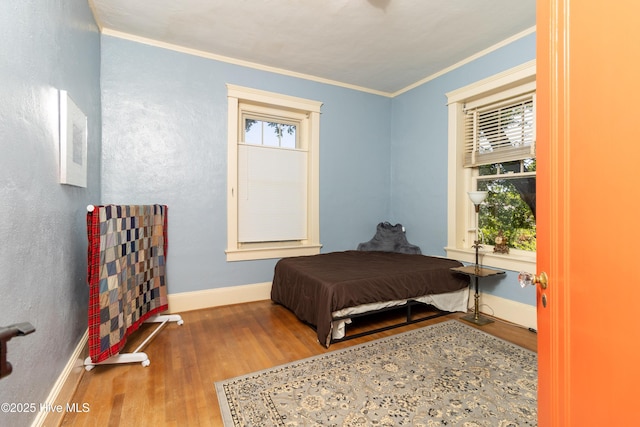 119 S Main St, Colerain, NC 27924 - bedroom featuring wood finished floors and crown molding