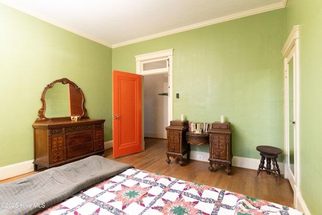 119 S Main St, Colerain, NC 27924 - bedroom with wood finished floors and ornamental molding