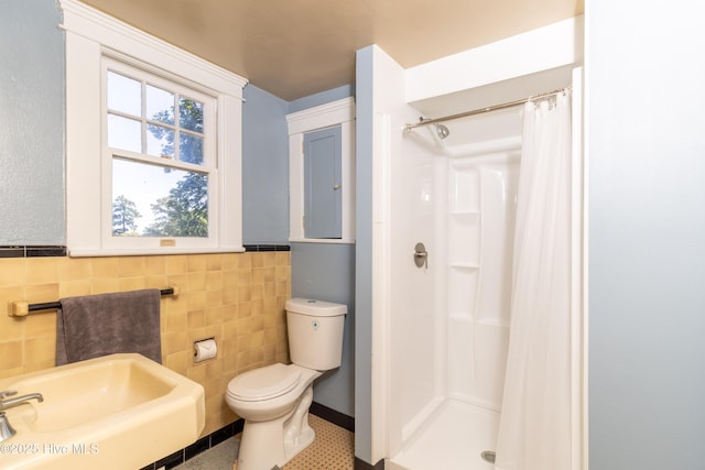 119 S Main St, Colerain, NC 27924 - bathroom with a stall shower and tile walls