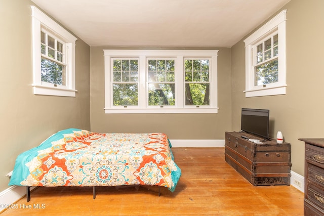 119 S Main St, Colerain, NC 27924 - bedroom with baseboards and wood finished floors