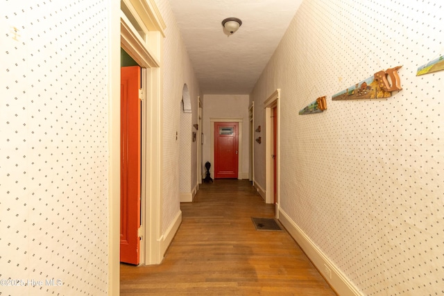 119 S Main St, Colerain, NC 27924 - corridor with wallpapered walls and light wood-type flooring