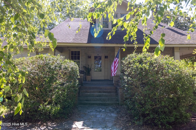 119 S Main St, Colerain, NC 27924 - view of front of house with covered porch and roof with shingles