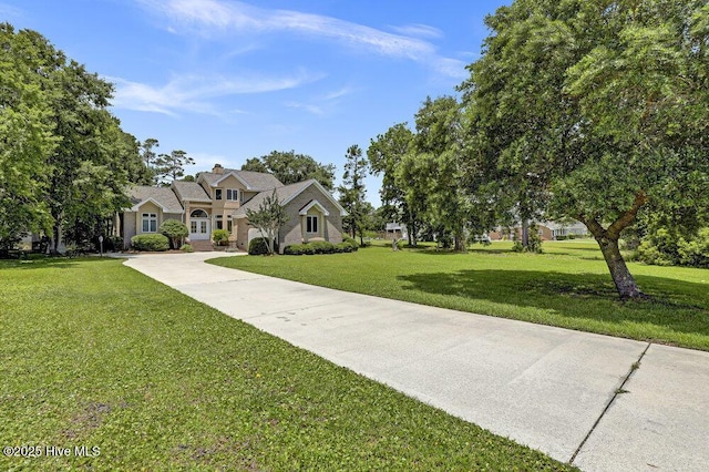 108 Sound View Dr, Hampstead, NC 28443 - traditional-style house with driveway and a front yard