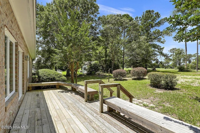 108 Sound View Dr, Hampstead, NC 28443 - wooden terrace featuring a yard and view of wooded area