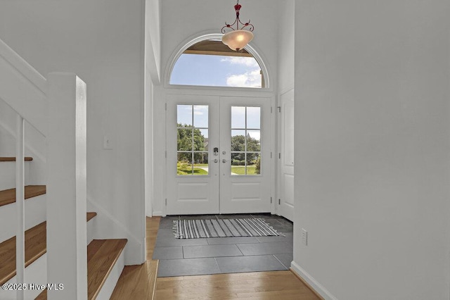 108 Sound View Dr, Hampstead, NC 28443 - tiled foyer featuring french doors and stairway