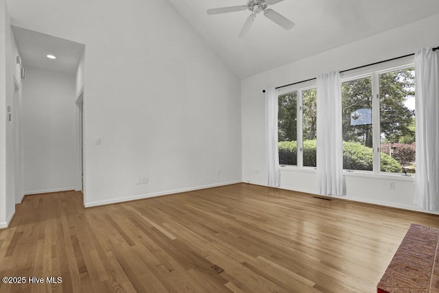 108 Sound View Dr, Hampstead, NC 28443 - unfurnished room featuring light wood-style floors, a ceiling fan, high vaulted ceiling, and recessed lighting