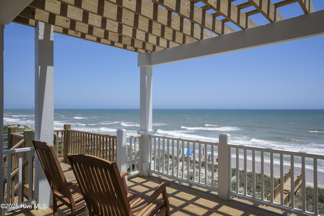 1326 New River Inlet Rd, North Topsail Beach, NC 28460 - balcony featuring view of water and beach and a pergola