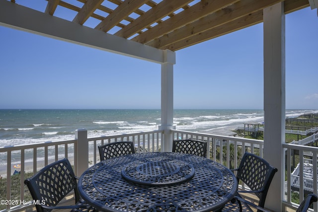1326 New River Inlet Rd, North Topsail Beach, NC 28460 - balcony featuring outdoor dining space and view of water and beach