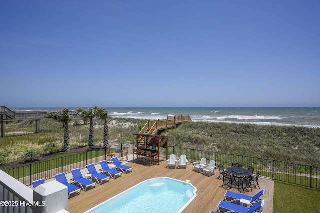 1326 New River Inlet Rd, North Topsail Beach, NC 28460 - view of pool featuring a deck with water view and a beach view