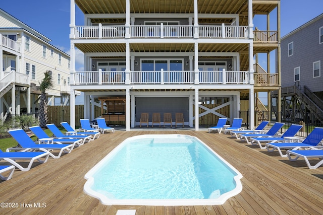 1326 New River Inlet Rd, North Topsail Beach, NC 28460 - back of property featuring a deck and stairway