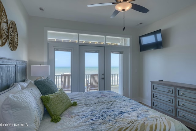 1326 New River Inlet Rd, North Topsail Beach, NC 28460 - bedroom featuring french doors, access to outside, ceiling fan, and wood finished floors