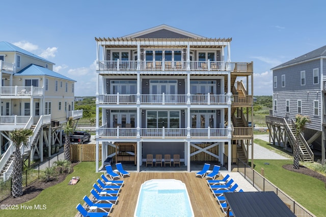 1326 New River Inlet Rd, North Topsail Beach, NC 28460 - back of property featuring stairs and a pergola