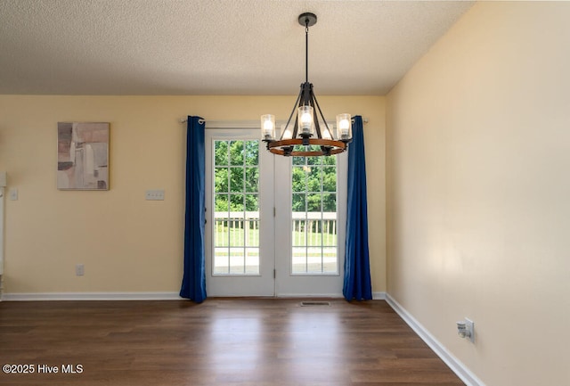 5025 NC Highway 55 E, New Bern, NC 28560 - spare room featuring a chandelier, dark wood finished floors, and a textured ceiling