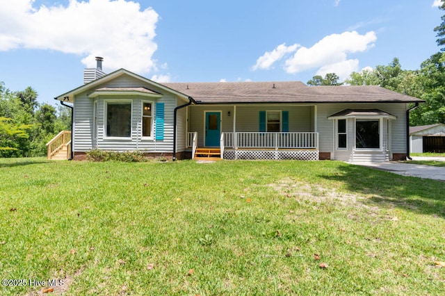 5025 NC Highway 55 E, New Bern, NC 28560 - single story home with covered porch, a chimney, and a front yard