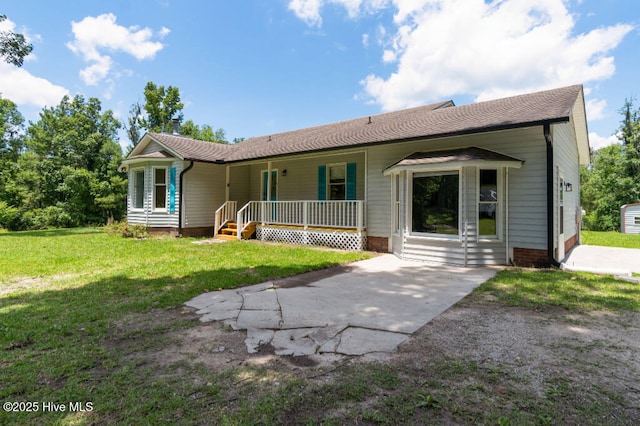 5025 NC Highway 55 E, New Bern, NC 28560 - ranch-style house featuring covered porch and a front lawn