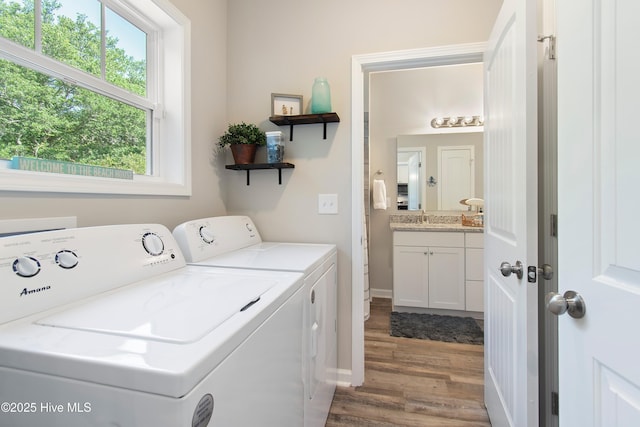 109 SW 17th St, Oak Island, NC 28465 - washroom with separate washer and dryer and wood finished floors