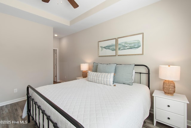 109 SW 17th St, Oak Island, NC 28465 - bedroom with dark wood finished floors, ceiling fan, and recessed lighting