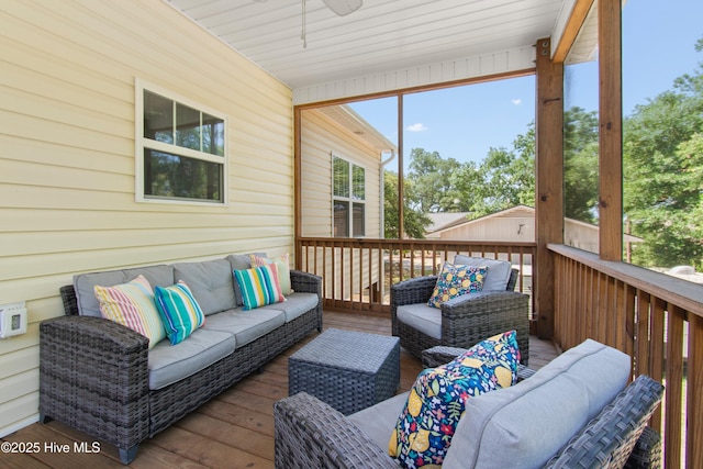 109 SW 17th St, Oak Island, NC 28465 - sunroom featuring outdoor lounge area and a ceiling fan