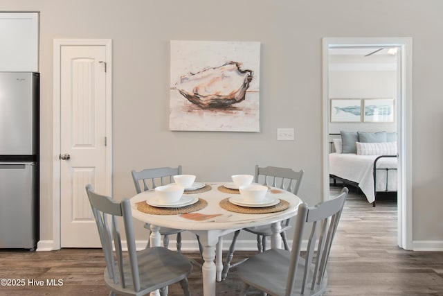 109 SW 17th St, Oak Island, NC 28465 - dining area with wood finished floors and baseboards